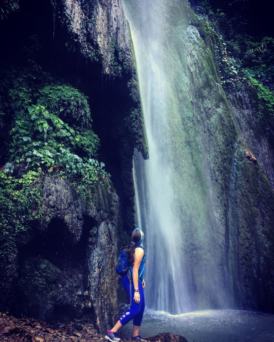 https://rishikeshnomads.com/wp-content/uploads/2024/09/girl-infront-of-patna-waterfall-in-rishikesh.jpg?utm_source=chatgpt.com